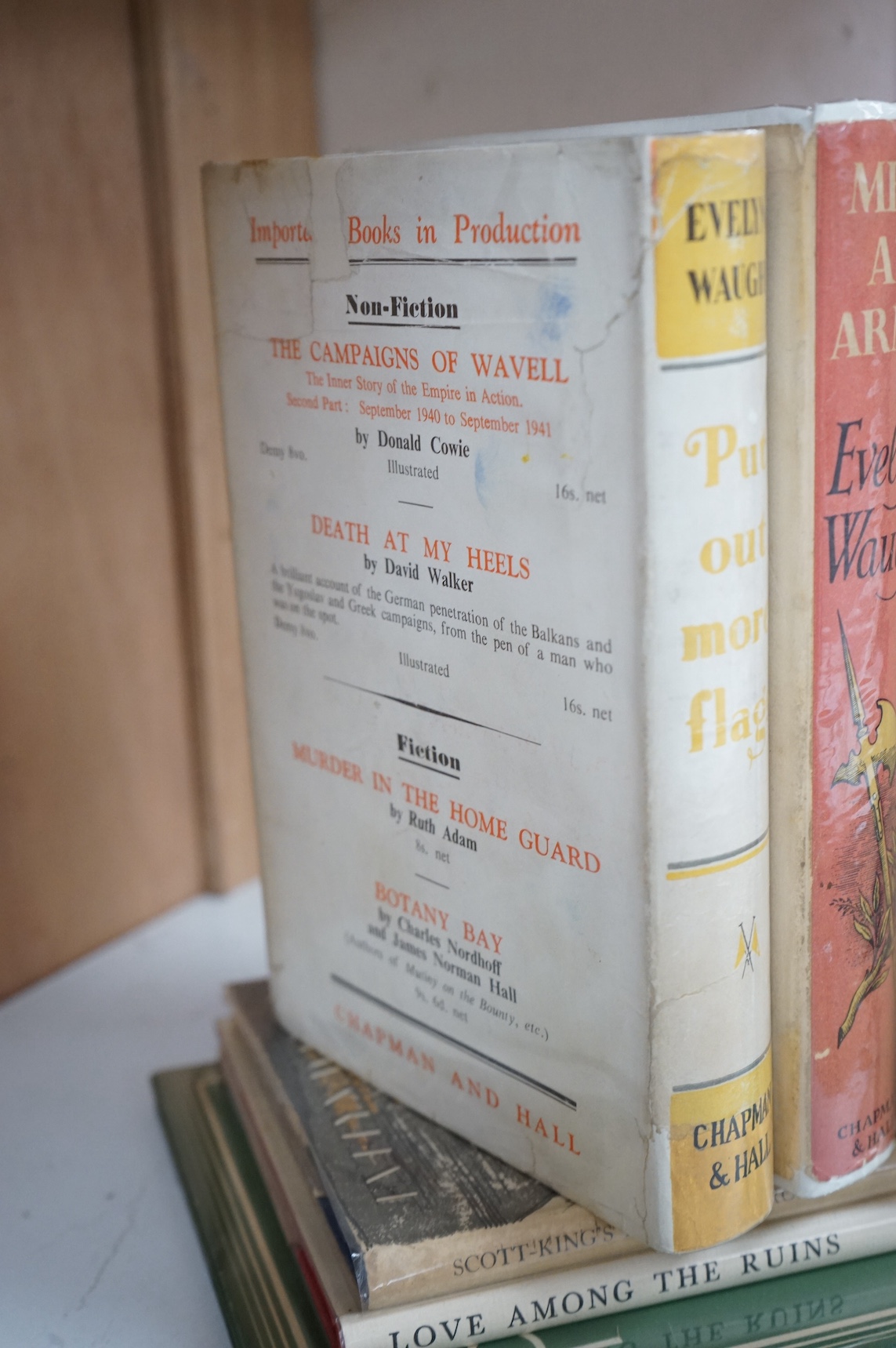 Six various Evelyn Waugh books and another by George Orwell to include Put Out More Flags, Men At Arms, Officers and Gentlemen, Unconditional Surrender, Scott-Kings Modern Europe, Love Among The Ruins and The English Peo